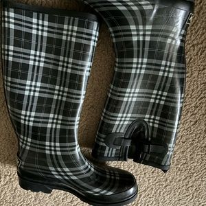Rubber sole knee high rain boots